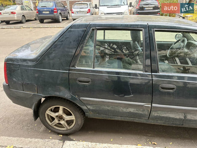 Зеленый Дачия Соленза, объемом двигателя 1.4 л и пробегом 130 тыс. км за 1130 $, фото 6 на Automoto.ua