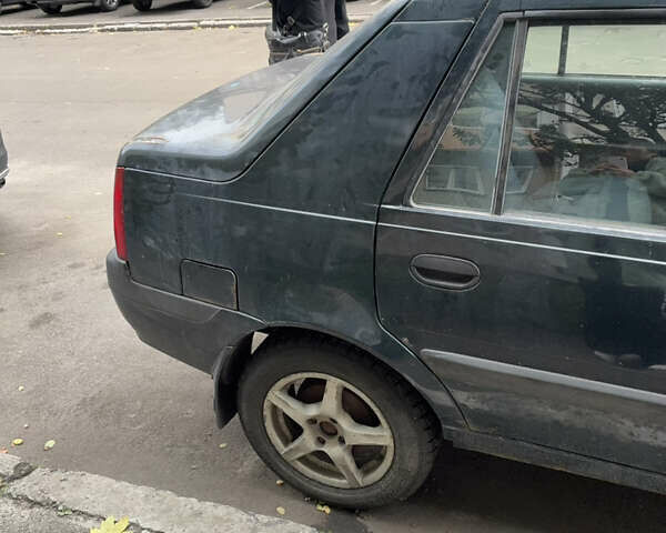 Зеленый Дачия Соленза, объемом двигателя 1.4 л и пробегом 130 тыс. км за 1130 $, фото 5 на Automoto.ua