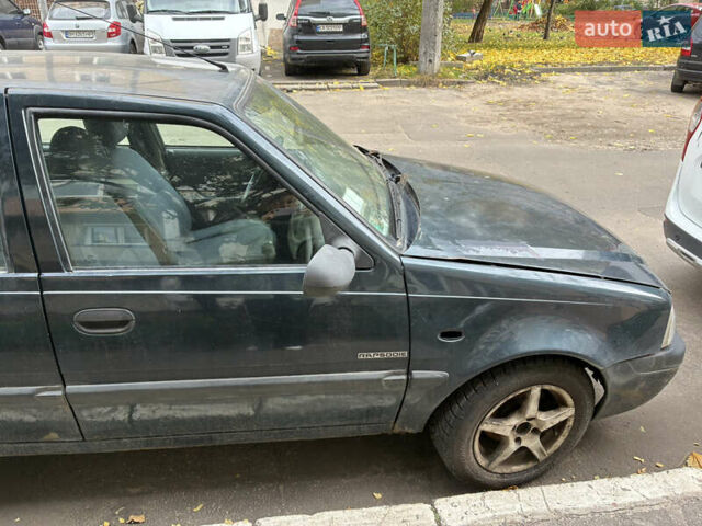 Зеленый Дачия Соленза, объемом двигателя 1.4 л и пробегом 130 тыс. км за 1130 $, фото 7 на Automoto.ua