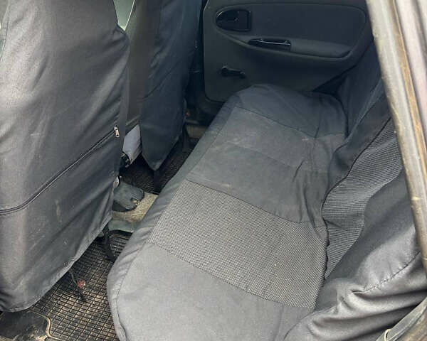 Черный Дачия Супер Нова, объемом двигателя 1.4 л и пробегом 270 тыс. км за 1660 $, фото 5 на Automoto.ua