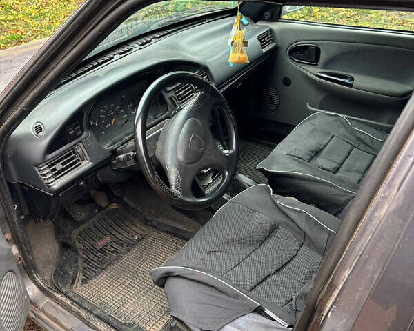 Черный Дачия Супер Нова, объемом двигателя 1.4 л и пробегом 270 тыс. км за 1660 $, фото 3 на Automoto.ua