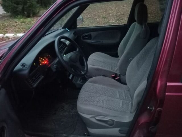 Красный Дачия Супер Нова, объемом двигателя 1.4 л и пробегом 1 тыс. км за 550 $, фото 6 на Automoto.ua