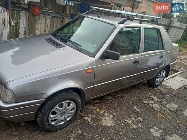 Серый Дачия Супер Нова, объемом двигателя 1.4 л и пробегом 320 тыс. км за 1900 $, фото 1 на Automoto.ua