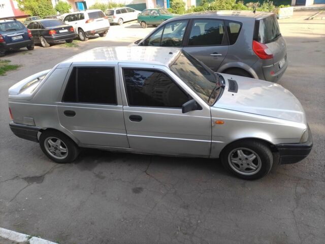 Сірий Дачія SuperNova, об'ємом двигуна 1.4 л та пробігом 208 тис. км за 900 $, фото 7 на Automoto.ua