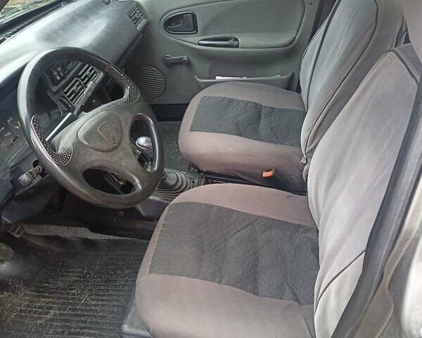 Серый Дачия Супер Нова, объемом двигателя 1.4 л и пробегом 320 тыс. км за 1900 $, фото 4 на Automoto.ua