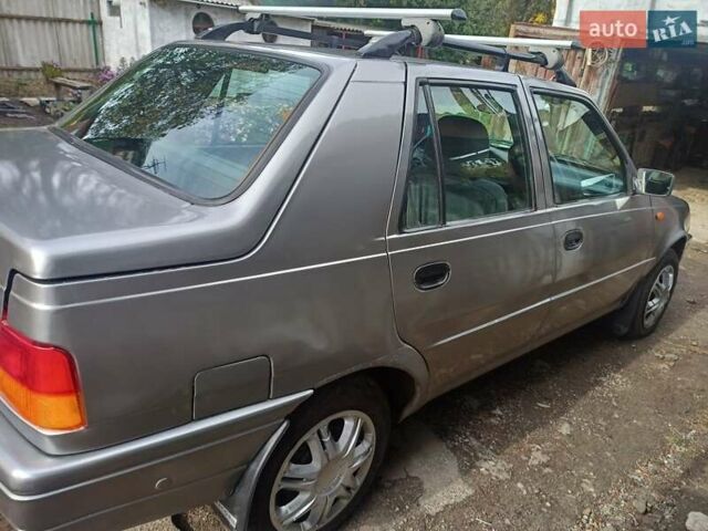 Серый Дачия Супер Нова, объемом двигателя 1.4 л и пробегом 320 тыс. км за 1900 $, фото 2 на Automoto.ua