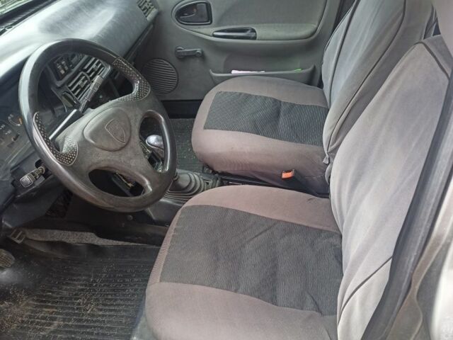 Серый Дачия Супер Нова, объемом двигателя 1.4 л и пробегом 320 тыс. км за 1900 $, фото 5 на Automoto.ua