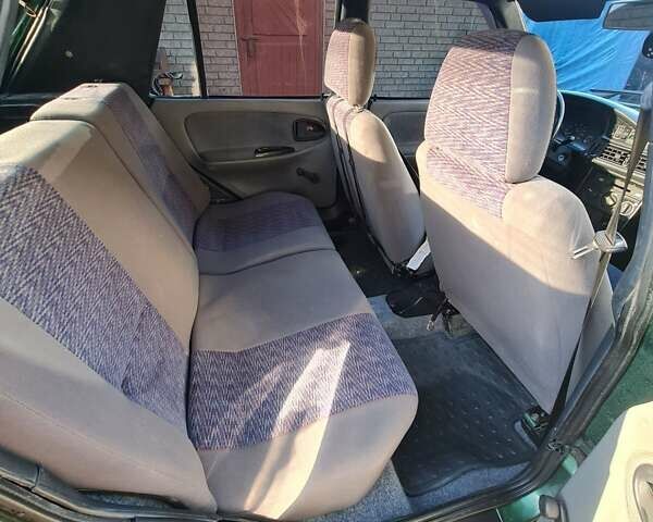 Зелений Дачія SuperNova, об'ємом двигуна 1.4 л та пробігом 90 тис. км за 1500 $, фото 14 на Automoto.ua