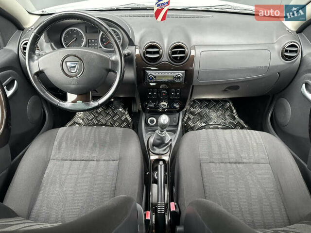 Білий Дачія Duster, об'ємом двигуна 1.6 л та пробігом 243 тис. км за 8750 $, фото 10 на Automoto.ua