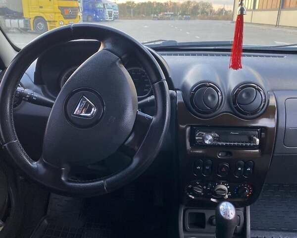 Білий Дачія Duster, об'ємом двигуна 1.6 л та пробігом 181 тис. км за 8700 $, фото 8 на Automoto.ua
