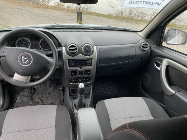 Білий Дачія Duster, об'ємом двигуна 1.6 л та пробігом 223 тис. км за 6899 $, фото 10 на Automoto.ua