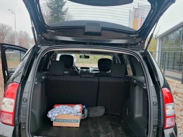 Черный Дачия Duster, объемом двигателя 1.2 л и пробегом 162 тыс. км за 9999 $, фото 4 на Automoto.ua