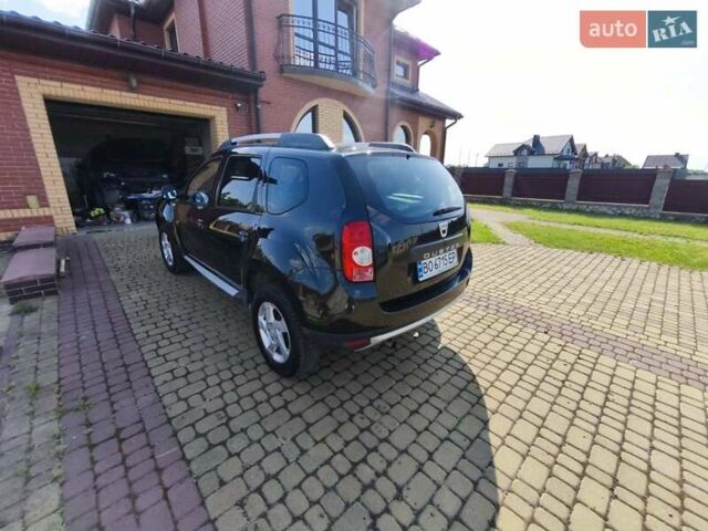 Чорний Дачія Duster, об'ємом двигуна 1.6 л та пробігом 112 тис. км за 9999 $, фото 12 на Automoto.ua