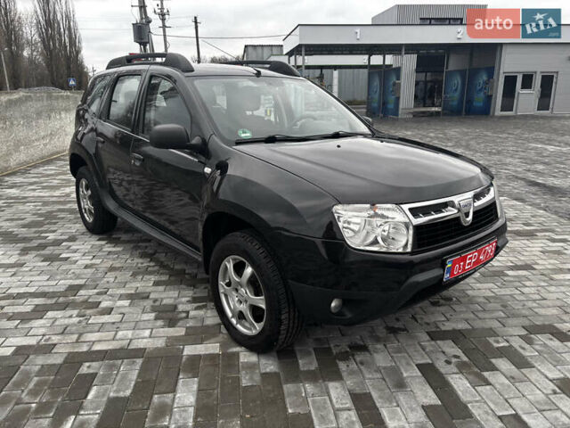 Черный Дачия Duster, объемом двигателя 1.6 л и пробегом 181 тыс. км за 8300 $, фото 4 на Automoto.ua