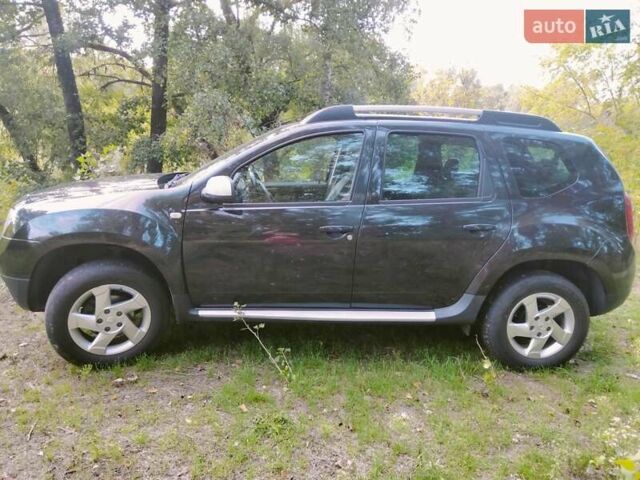 Чорний Дачія Duster, об'ємом двигуна 1.6 л та пробігом 158 тис. км за 8000 $, фото 1 на Automoto.ua