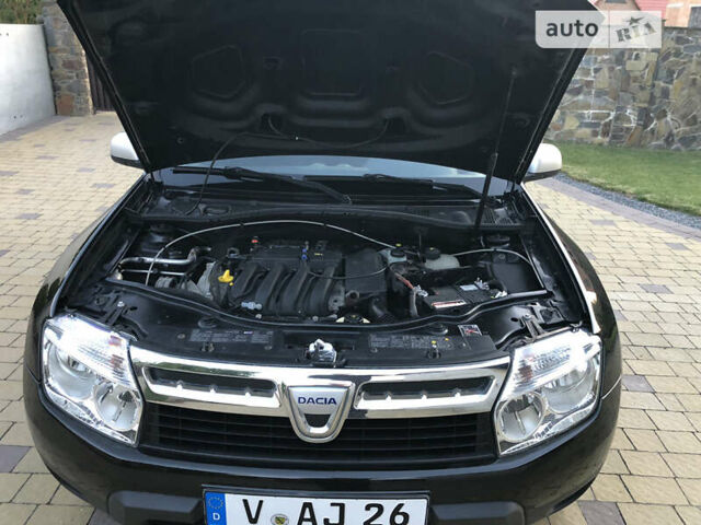 Чорний Дачія Duster, об'ємом двигуна 1.6 л та пробігом 165 тис. км за 8250 $, фото 30 на Automoto.ua