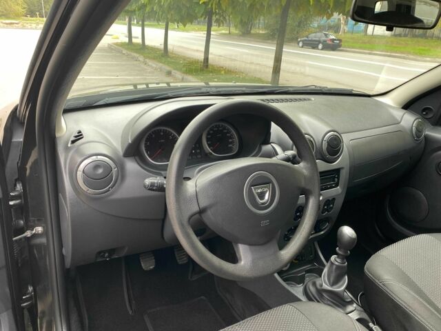 Черный Дачия Duster, объемом двигателя 1.6 л и пробегом 230 тыс. км за 7999 $, фото 4 на Automoto.ua