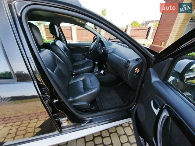 Чорний Дачія Duster, об'ємом двигуна 1.6 л та пробігом 112 тис. км за 9999 $, фото 13 на Automoto.ua