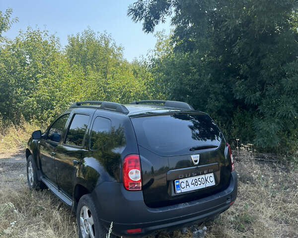 Чорний Дачія Duster, об'ємом двигуна 1.6 л та пробігом 241 тис. км за 7100 $, фото 20 на Automoto.ua