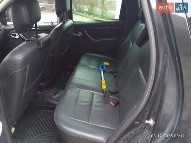 Черный Дачия Duster, объемом двигателя 1.6 л и пробегом 238 тыс. км за 9100 $, фото 5 на Automoto.ua