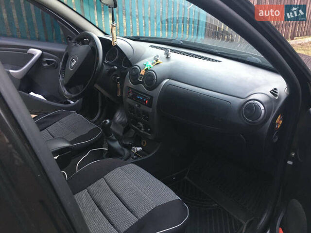 Чорний Дачія Duster, об'ємом двигуна 1.6 л та пробігом 241 тис. км за 7100 $, фото 7 на Automoto.ua