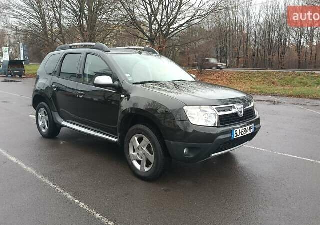 Черный Дачия Duster, объемом двигателя 1.6 л и пробегом 240 тыс. км за 8000 $, фото 2 на Automoto.ua
