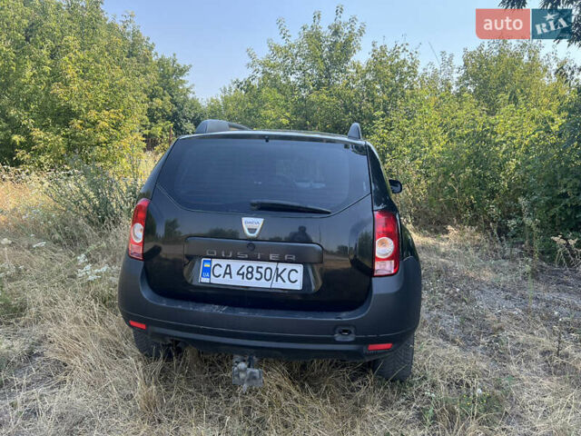 Чорний Дачія Duster, об'ємом двигуна 1.6 л та пробігом 241 тис. км за 7100 $, фото 13 на Automoto.ua