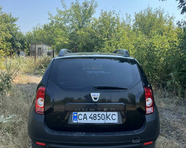 Чорний Дачія Duster, об'ємом двигуна 1.6 л та пробігом 241 тис. км за 7100 $, фото 9 на Automoto.ua