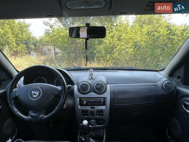 Чорний Дачія Duster, об'ємом двигуна 1.6 л та пробігом 241 тис. км за 7100 $, фото 23 на Automoto.ua