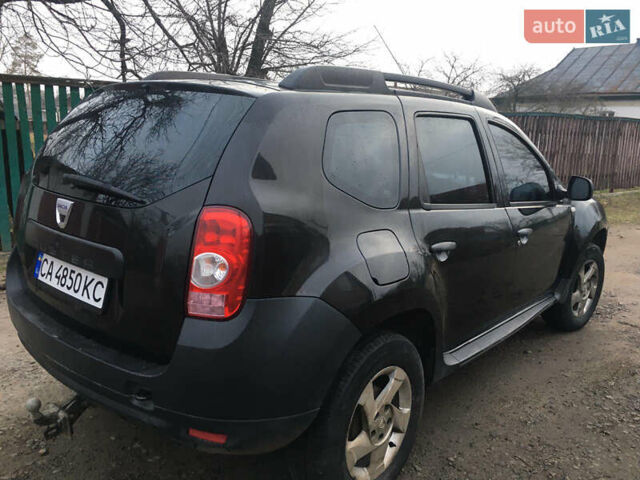 Чорний Дачія Duster, об'ємом двигуна 1.6 л та пробігом 241 тис. км за 7100 $, фото 2 на Automoto.ua