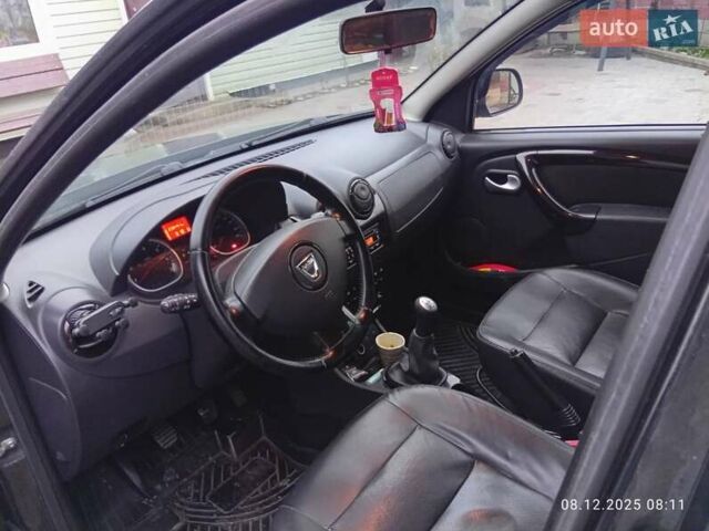 Черный Дачия Duster, объемом двигателя 1.6 л и пробегом 238 тыс. км за 9100 $, фото 4 на Automoto.ua