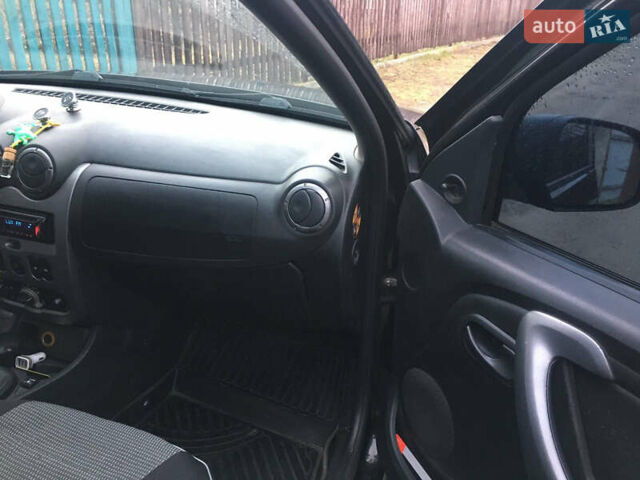 Чорний Дачія Duster, об'ємом двигуна 1.6 л та пробігом 241 тис. км за 7100 $, фото 6 на Automoto.ua