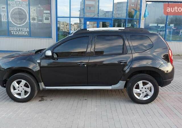 Чорний Дачія Duster, об'ємом двигуна 1.6 л та пробігом 209 тис. км за 9200 $, фото 1 на Automoto.ua