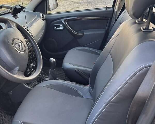 Черный Дачия Duster, объемом двигателя 1.6 л и пробегом 200 тыс. км за 8099 $, фото 3 на Automoto.ua
