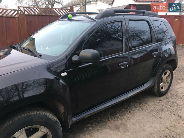 Чорний Дачія Duster, об'ємом двигуна 1.6 л та пробігом 241 тис. км за 7100 $, фото 1 на Automoto.ua