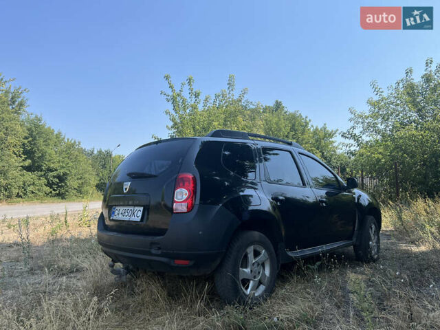 Чорний Дачія Duster, об'ємом двигуна 1.6 л та пробігом 241 тис. км за 7100 $, фото 10 на Automoto.ua