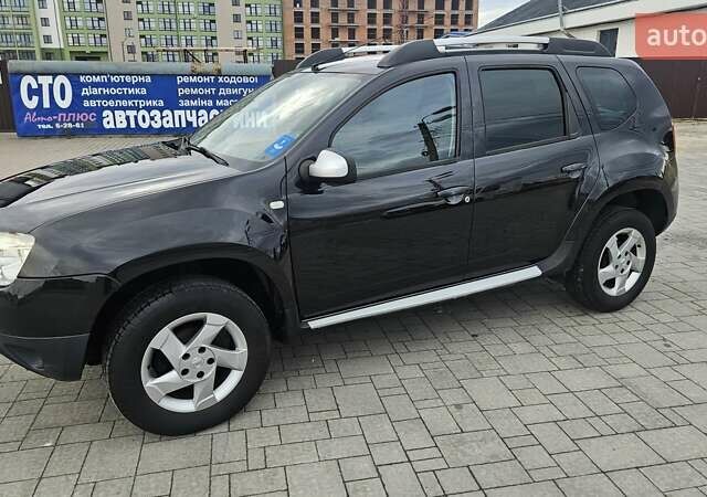 Черный Дачия Duster, объемом двигателя 1.6 л и пробегом 194 тыс. км за 8777 $, фото 1 на Automoto.ua