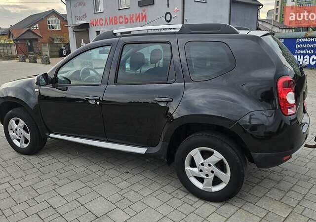Черный Дачия Duster, объемом двигателя 1.6 л и пробегом 194 тыс. км за 8700 $, фото 5 на Automoto.ua