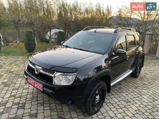 Чорний Дачія Duster, об'ємом двигуна 1.6 л та пробігом 210 тис. км за 8550 $, фото 1 на Automoto.ua