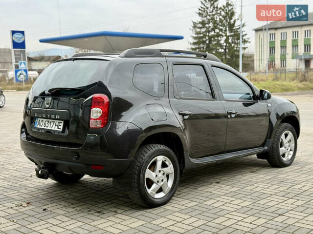 Чорний Дачія Duster, об'ємом двигуна 1.6 л та пробігом 175 тис. км за 7900 $, фото 4 на Automoto.ua