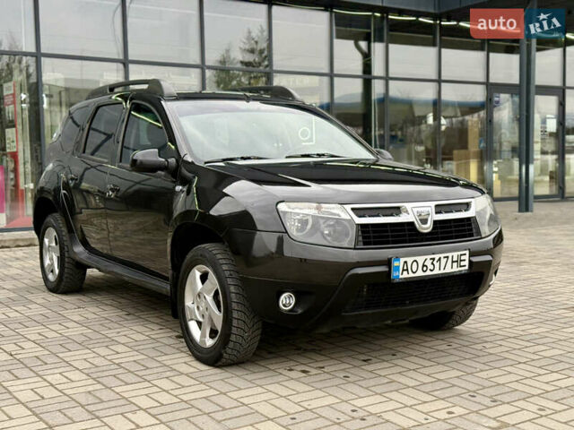 Чорний Дачія Duster, об'ємом двигуна 1.6 л та пробігом 175 тис. км за 7900 $, фото 2 на Automoto.ua