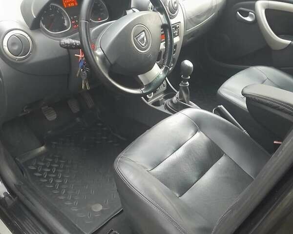 Черный Дачия Duster, объемом двигателя 1.5 л и пробегом 241 тыс. км за 9500 $, фото 6 на Automoto.ua