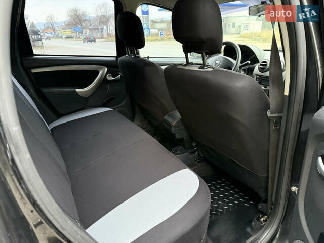Чорний Дачія Duster, об'ємом двигуна 1.6 л та пробігом 175 тис. км за 7900 $, фото 13 на Automoto.ua