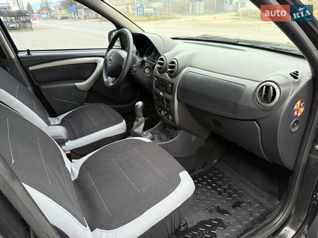 Чорний Дачія Duster, об'ємом двигуна 1.6 л та пробігом 175 тис. км за 7900 $, фото 12 на Automoto.ua
