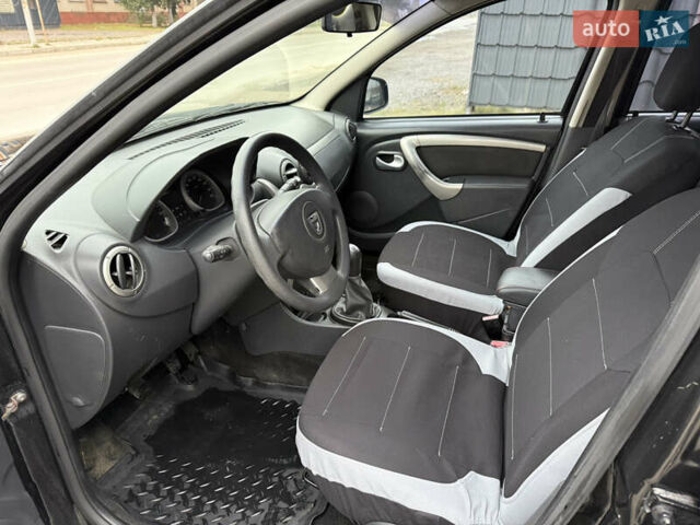 Чорний Дачія Duster, об'ємом двигуна 1.6 л та пробігом 175 тис. км за 7900 $, фото 9 на Automoto.ua