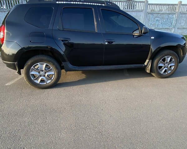 Чорний Дачія Duster, об'ємом двигуна 1.6 л та пробігом 227 тис. км за 10850 $, фото 1 на Automoto.ua