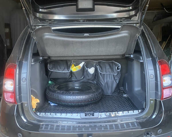 Чорний Дачія Duster, об'ємом двигуна 1.6 л та пробігом 227 тис. км за 10850 $, фото 17 на Automoto.ua