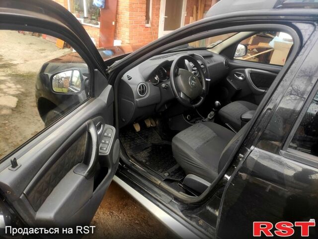 Черный Дачия Duster, объемом двигателя 1.5 л и пробегом 215 тыс. км за 10600 $, фото 2 на Automoto.ua