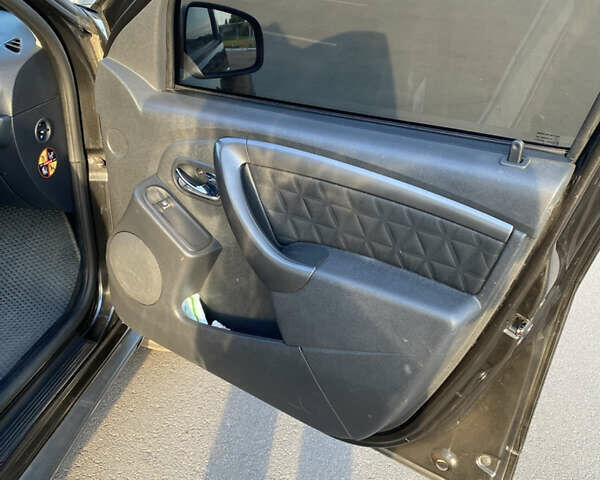 Чорний Дачія Duster, об'ємом двигуна 1.6 л та пробігом 227 тис. км за 10850 $, фото 11 на Automoto.ua