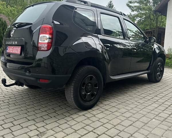 Черный Дачия Duster, объемом двигателя 1.2 л и пробегом 149 тыс. км за 8300 $, фото 2 на Automoto.ua